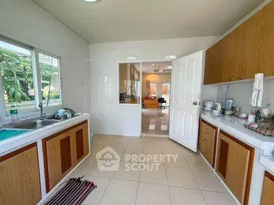 Spacious kitchen with open layout and modern appliances