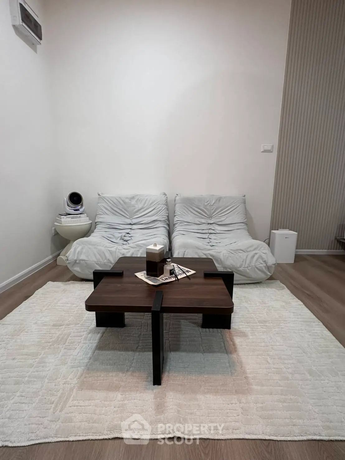 Cozy minimalist living room with modern furniture and soft lighting