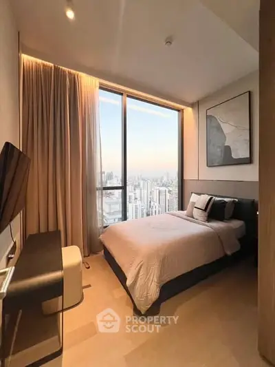 Luxurious bedroom with stunning city view and modern decor