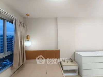 Modern bedroom with minimalist design and large window view