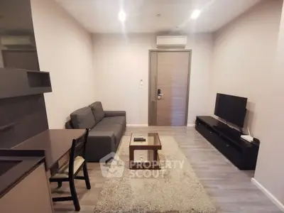 Modern living room with sleek furniture and minimalist design