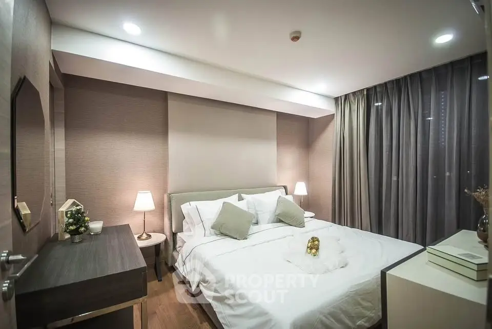 Luxurious bedroom with elegant decor and ambient lighting, perfect for relaxation and comfort.