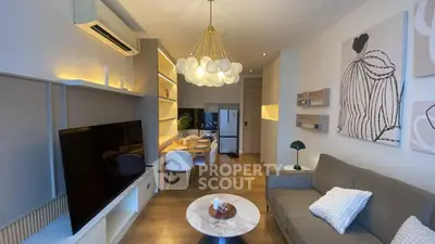 Stylish modern living room with elegant decor and open dining area