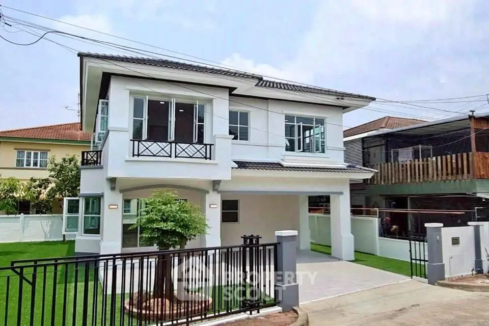 Charming two-story house with modern design and spacious driveway