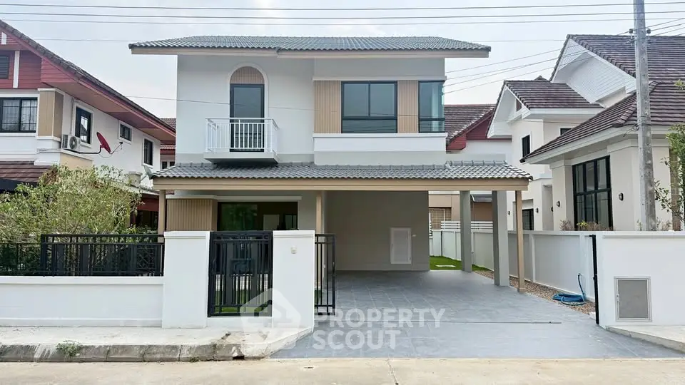 Modern two-story house with spacious driveway and stylish facade in suburban neighborhood.