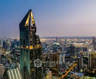 Stunning cityscape view with modern skyscraper at dusk, showcasing urban luxury living.