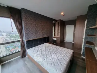 Spacious modern bedroom with city view and stylish decor