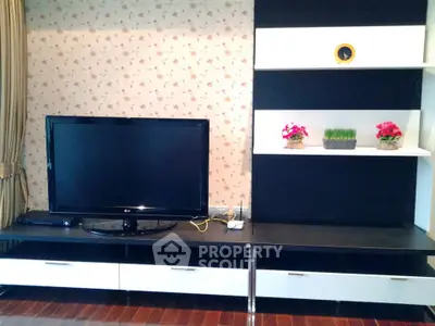 Stylish living room with modern TV setup and elegant decor