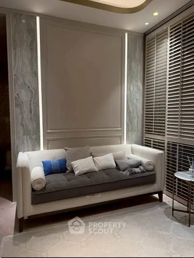 Luxurious living room with elegant sofa and ambient lighting