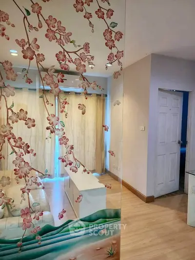 Charming living room with floral glass partition and cozy decor