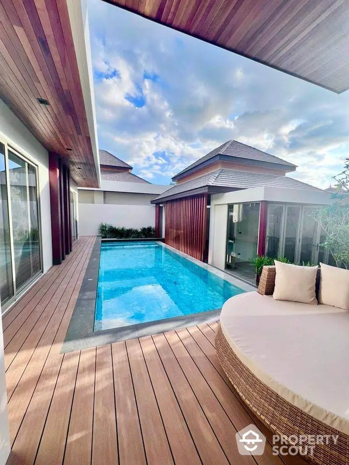 Luxurious modern villa with private pool and stylish deck, perfect for relaxation and entertainment.