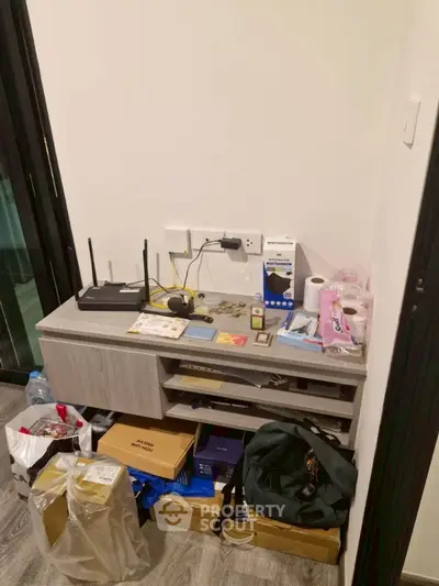 Compact storage corner with modern desk and organized essentials