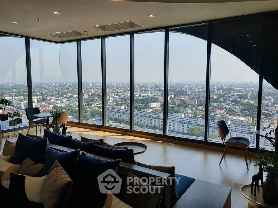 Luxurious living room with panoramic city view and modern decor