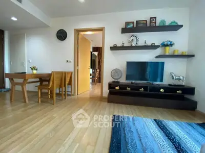 Modern living room with wooden flooring and stylish decor