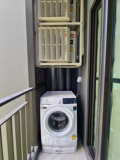 Compact balcony with washing machine and air conditioning units