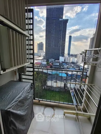 Charming balcony with city view, perfect for relaxation and enjoying urban skyline.