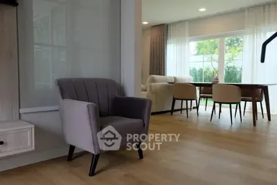 Spacious modern living room with elegant furniture and large windows