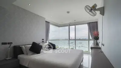 Luxurious bedroom with stunning ocean view and modern decor