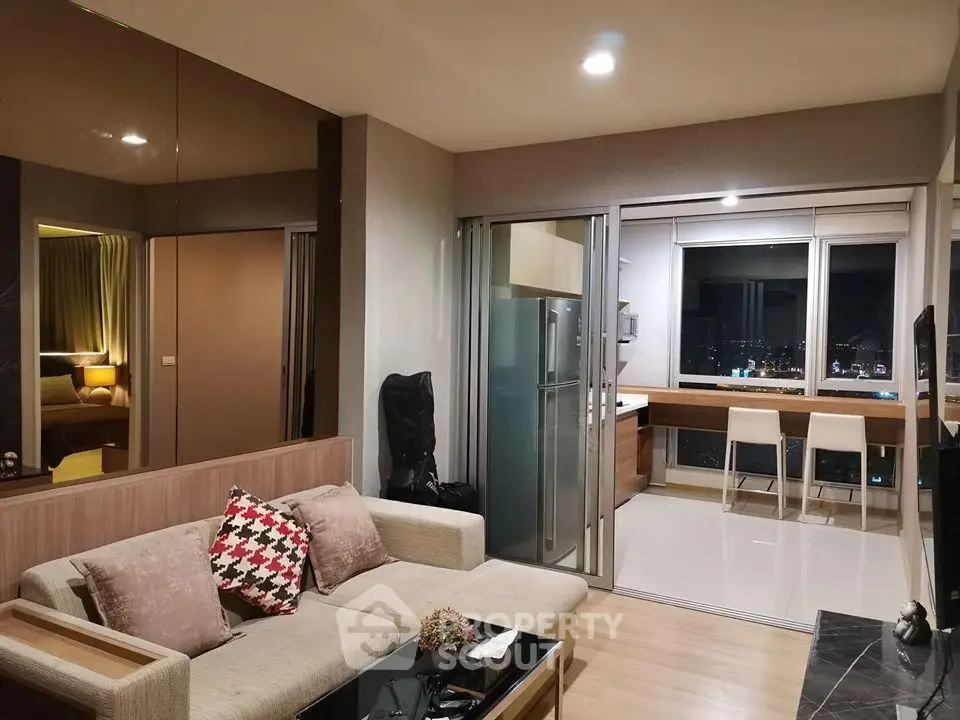 Modern living room with city view, open layout, and stylish decor