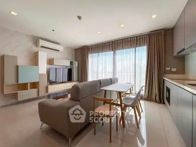 Spacious modern living room with large windows and stylish furniture
