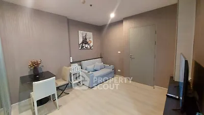 Modern living room with stylish decor and cozy seating area