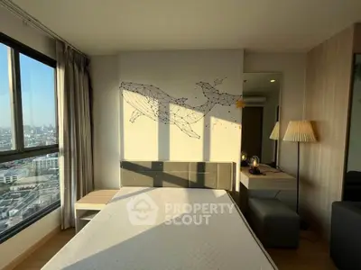 Modern bedroom with city view and stylish wall art in high-rise apartment