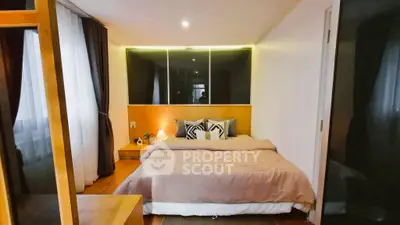 Cozy bedroom with modern decor and ambient lighting