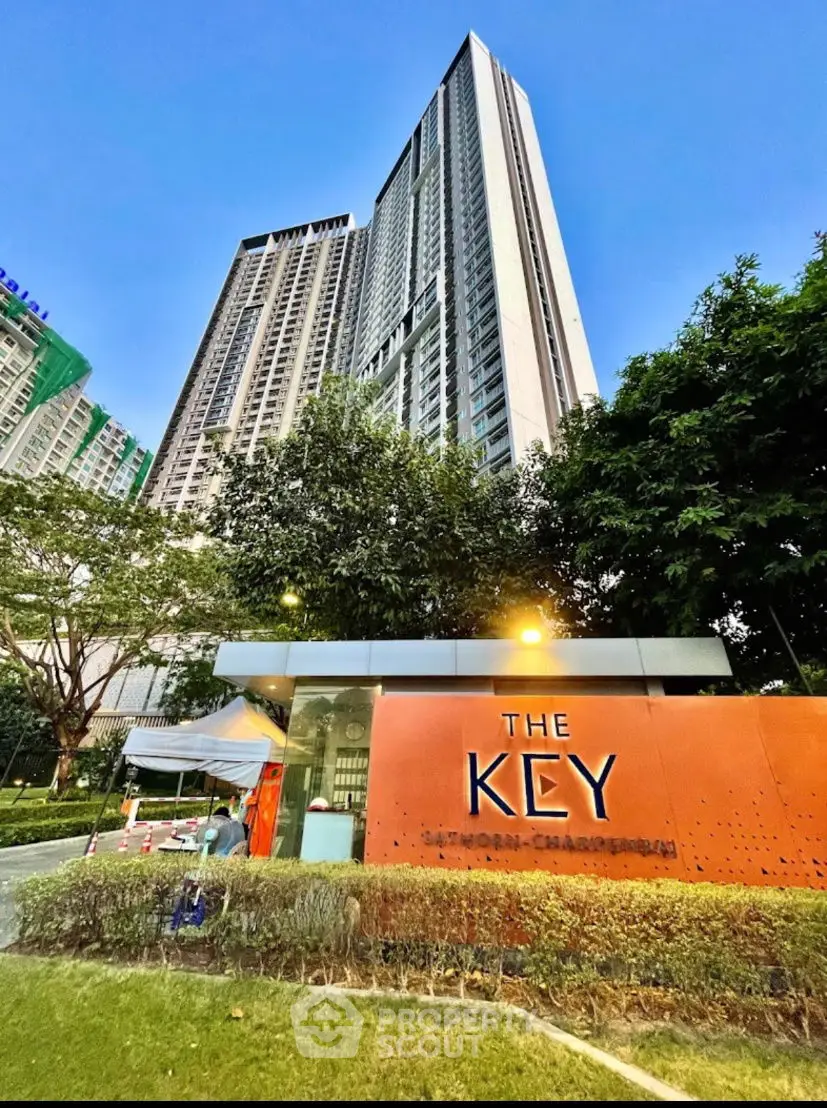 Stunning high-rise building with lush greenery at The Key Sathorn-Charoenraj