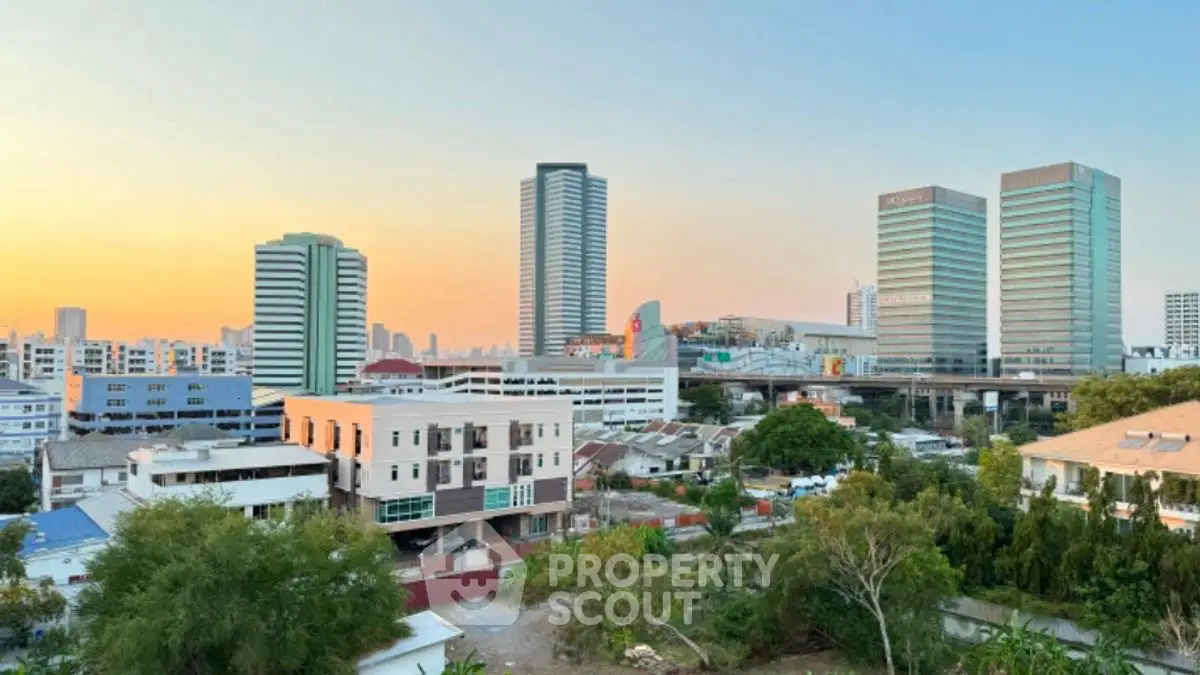 Stunning cityscape view with modern high-rise buildings at sunset