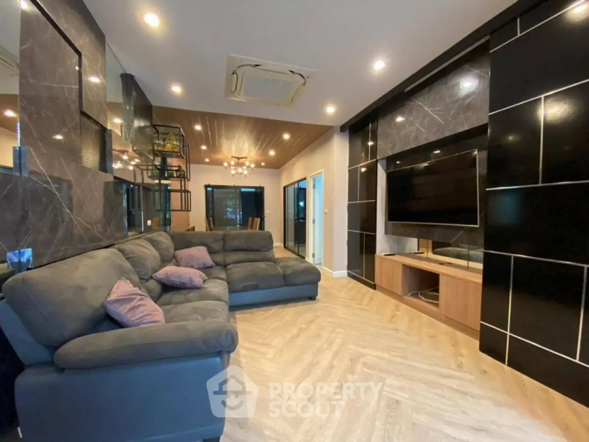 Luxurious living room with modern decor and spacious seating area