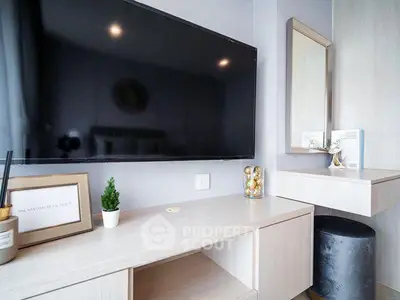 Modern living room with sleek TV setup and stylish decor