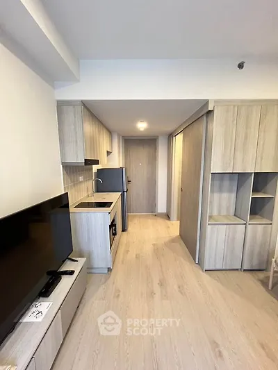 Modern apartment interior with sleek kitchen and open layout