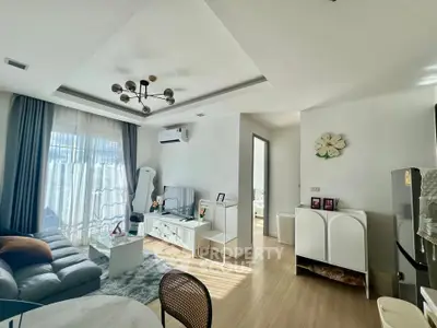 Bright and modern living room with stylish decor and natural light