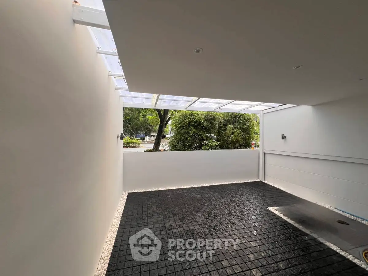 Spacious modern parking area with sleek design and natural light