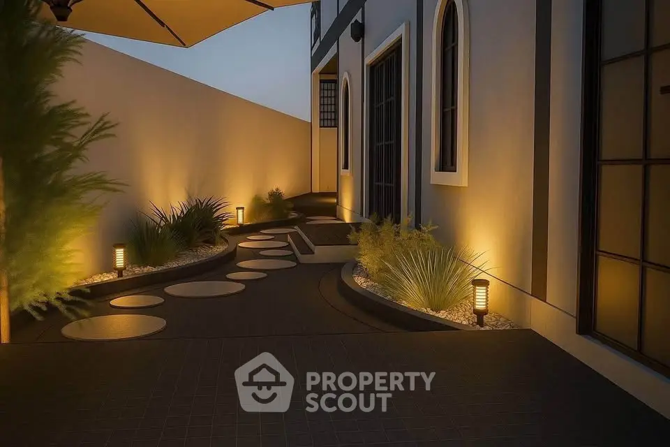 Elegant exterior pathway with modern lighting and landscaping at dusk