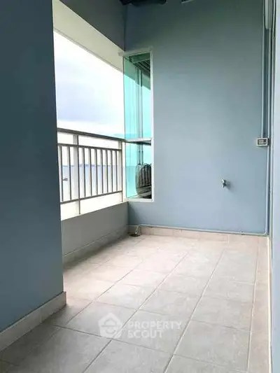 Spacious balcony with ocean view and modern design