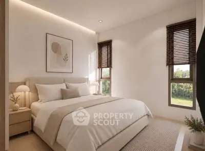 Elegant bedroom with modern decor and large windows offering natural light and scenic views.