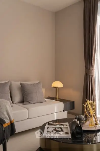 Stylish living room with cozy sofa and elegant decor