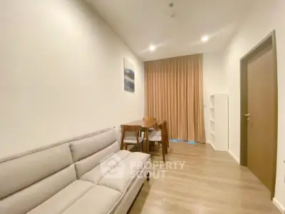 Cozy living room with modern furniture and elegant decor in a stylish apartment.