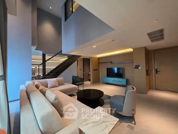 Luxurious modern living room with high ceilings and elegant furniture
