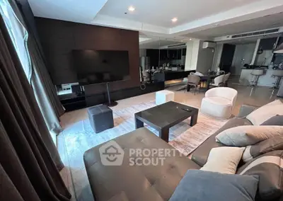 Luxurious modern living room with open kitchen layout and stylish furniture