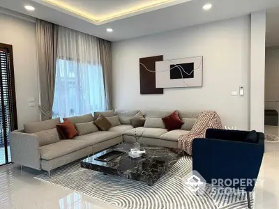 Luxurious modern living room with elegant sectional sofa and stylish decor