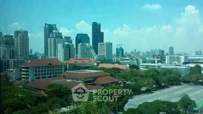 Stunning cityscape view showcasing modern skyscrapers and lush greenery