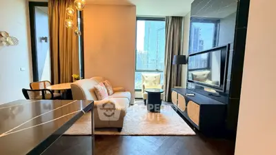 Luxurious modern living room with city view, elegant furniture, and stylish decor in high-rise apartment.
