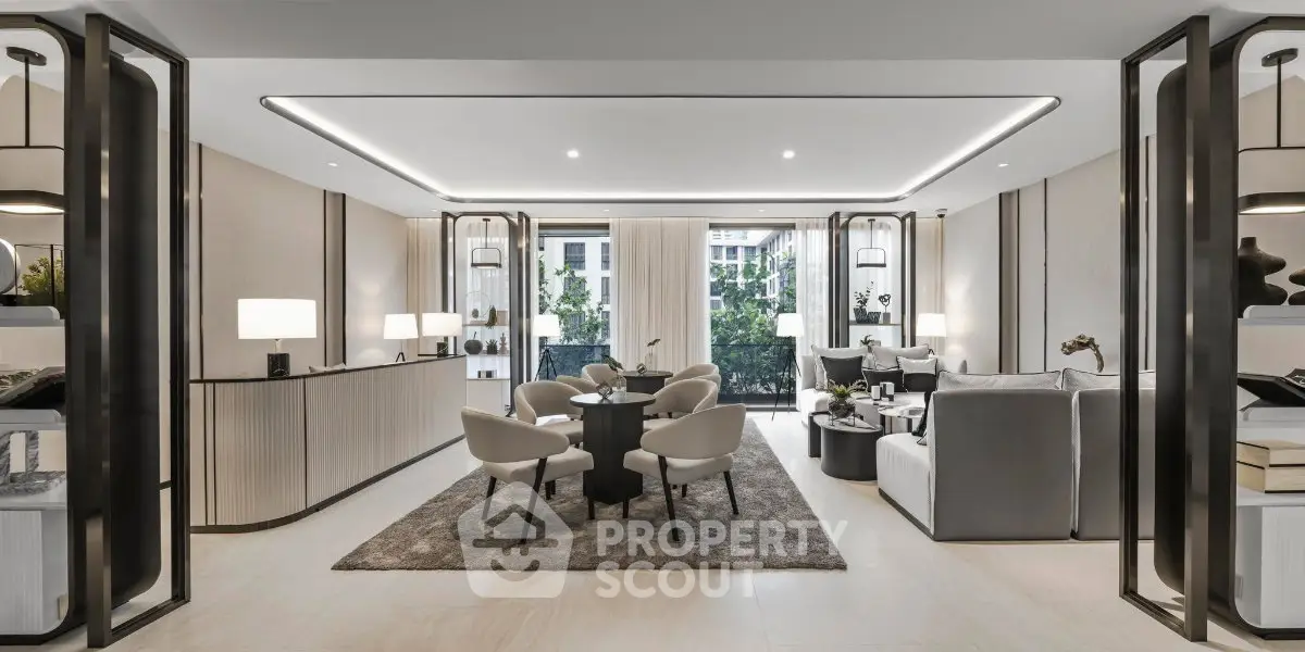 Luxurious modern living room with elegant decor and large windows offering natural light.