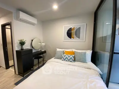 Modern bedroom with stylish decor and natural light