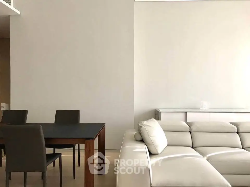 Modern living room with sleek furniture and minimalist design