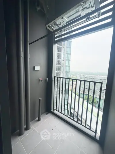 Modern balcony with city view in high-rise apartment