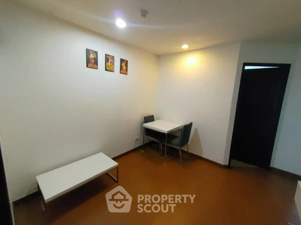 Cozy small dining area with modern furniture and warm lighting