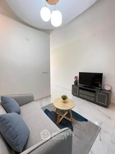 Modern living room with stylish decor and cozy seating area